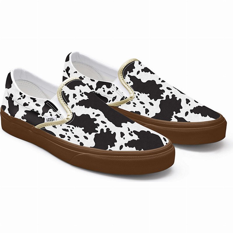 Vans cow print slip 2024 on